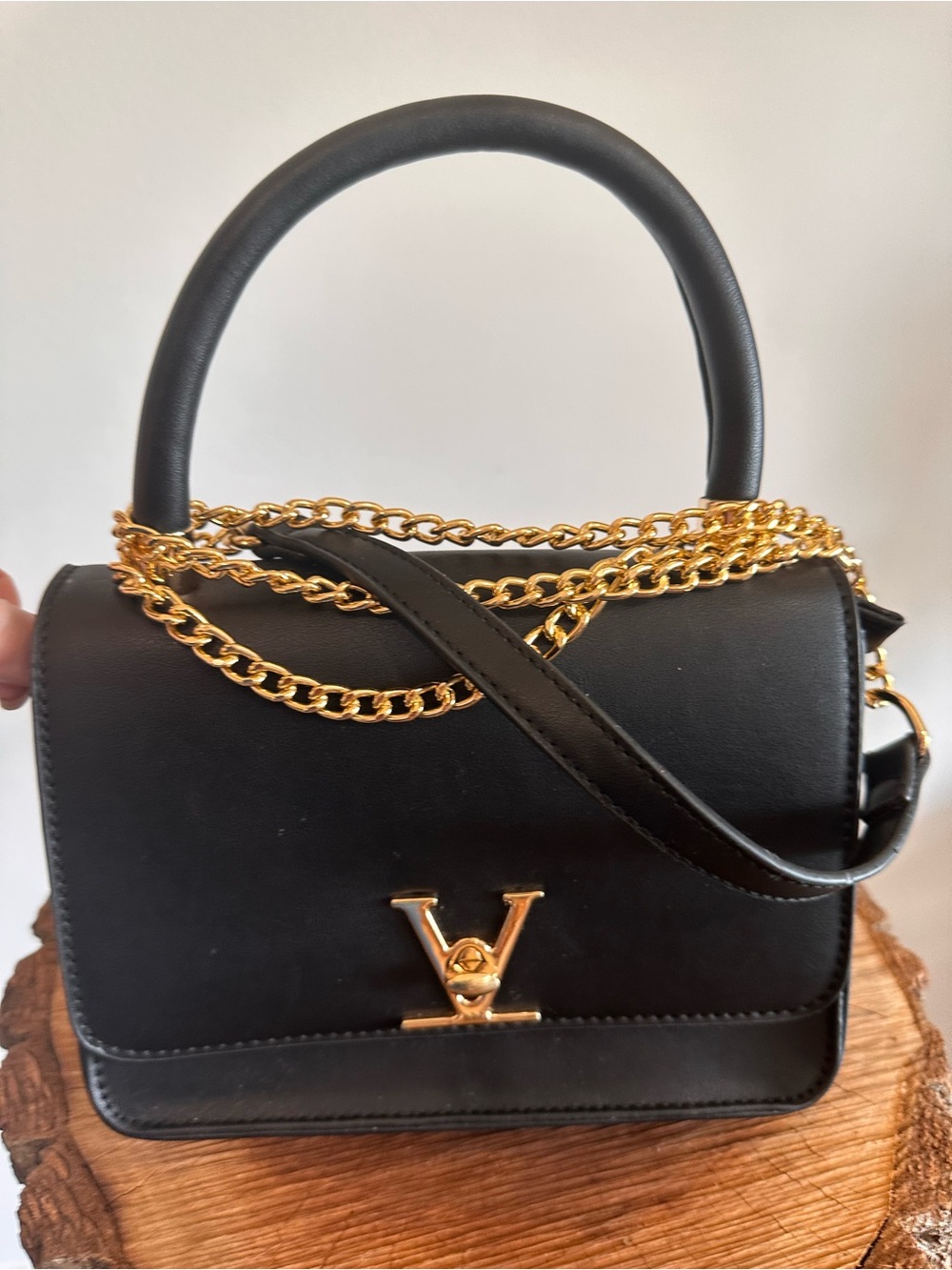 Black Leather Top-Handle Bag with Gold Chain Accent